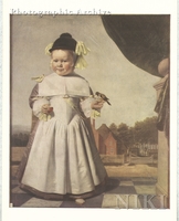 Portrait of a Two-Year-Old Boy Holding an Apple