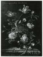 Still Life of Flowers in a Glass Vase on a Table