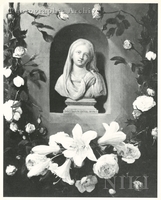 Bust of the Virgin Mary in a Stone Niche Surrounded by a Garland of Roses and Lilies