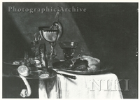 Still Life of a Pie on a Pewter Dish, a Nautilus Cup, Wine Glasses, an Overturned Tazza and a Peeled Lemon on a Draped Table