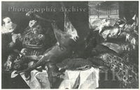 Still Life of Fruit in a Basket, a Dead Deer, a Lobster, a Peacock and Other Game Birds on a Draped Table