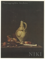 Earthenware Jug, a Glass, a Pipe, a Walnut