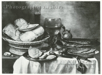 Breakfast Still Life with Cheese and Butter in a Basket, Bread on a Plate, Red Herrings and Beer and Wine Glass on a Draped Table