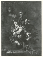 Flowers in a Vase Surrounded by Statues