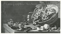 Still Life of a Peeled Lemon, Nuts, Grapes in a Basket and a Glass of Wine on a Table