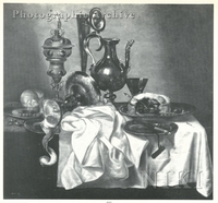 Still Life of a Steeple Jug, two Glasses of Wine, a Loaf of Bread, an Apple Pie, a Chalice, Nuts, Plates, a Peeled Lemon and a Knife on a Draped Table