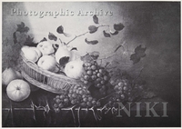 Still Life of Pears and Grapes in a Basket on a Draped Table