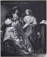 Two Ladies and a Gentleman Drinking and Playing a Game with a Glass