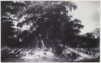 Wooded River Landscape with Figures by a Bridge