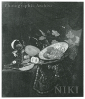 Rummer of Wine with a Peeled Lemon and a Slice of Melon on a Pewter Dish, a Cut Peach and a Bowl of Pomegranates and Grapes on a Silver Salver, on a Table with a Turkey Carpet