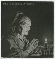 Old Woman Praying by Candlelight